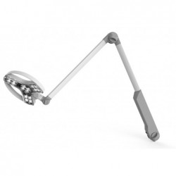 Lampe d'examen LED VISIANO blanche sur bras articulé, utilisée pour l'éclairage de précision dans un cabinet médical.